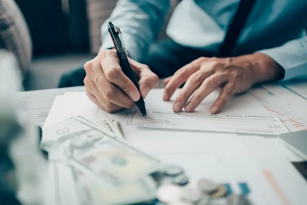 Practice manager reviewing a personal injury billing services contract